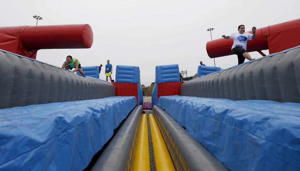 See the foamy, faceplanting fun of DFW's Wipeout Run GuideLive