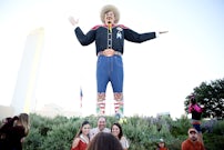 Texas Longhorns Fans From Left Nina Guerra Rick And Danielle Poses For A Photograph Next To Big Tex Before The Red River Showdown Between Texas Longhorns Fans From Left Nina Guerra Rick And Danielle Poses For A Photograph Next To Big Tex Before The Red River Showdown Between