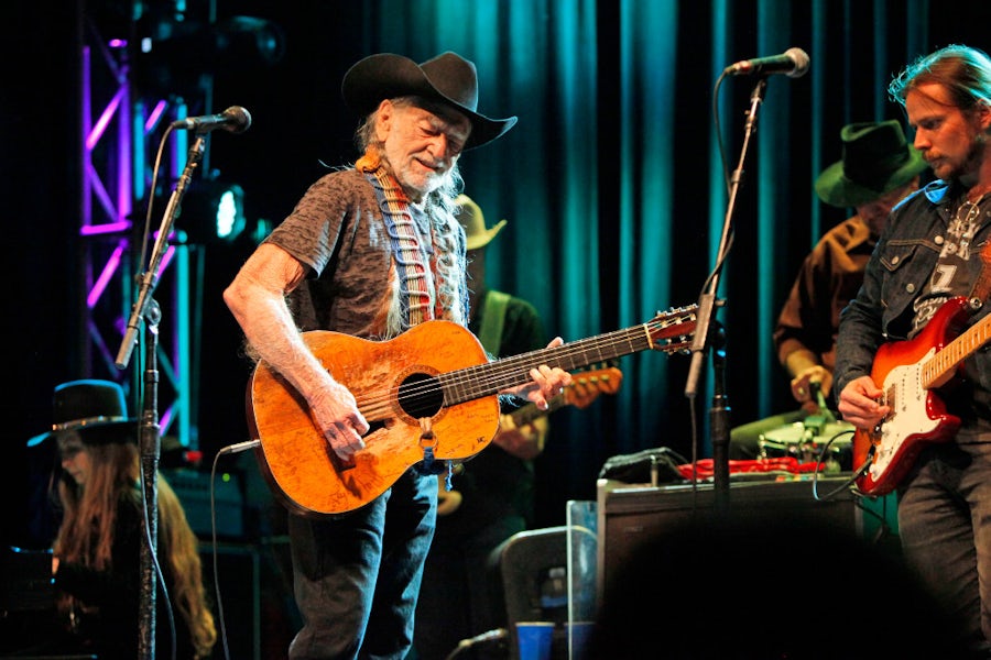 Willie Nelson played his usual buffet of classics and covers at